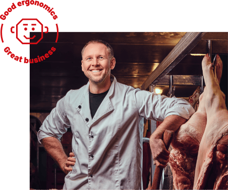 butcher leans on meat