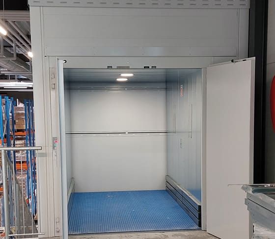 Empty Translyft goods lift in warehouse 